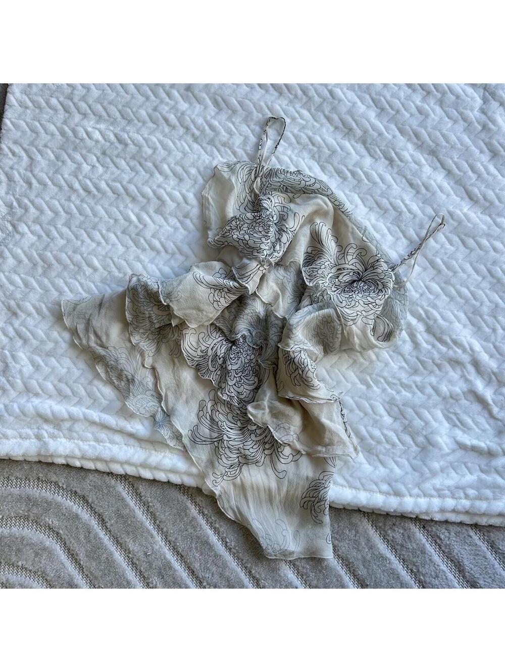 BCBGMAXAZRIA cream & white floral ruffle tank top with black floral embroidery